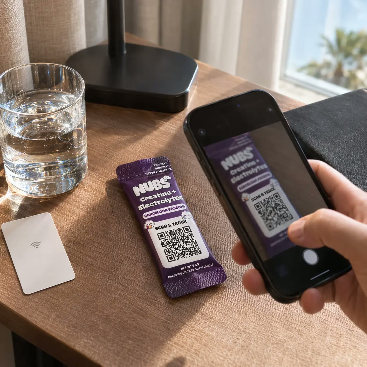 Phone scanning a Nubs stick in a hotel room